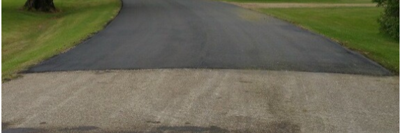 Freshly sealcoated asphalt driveway